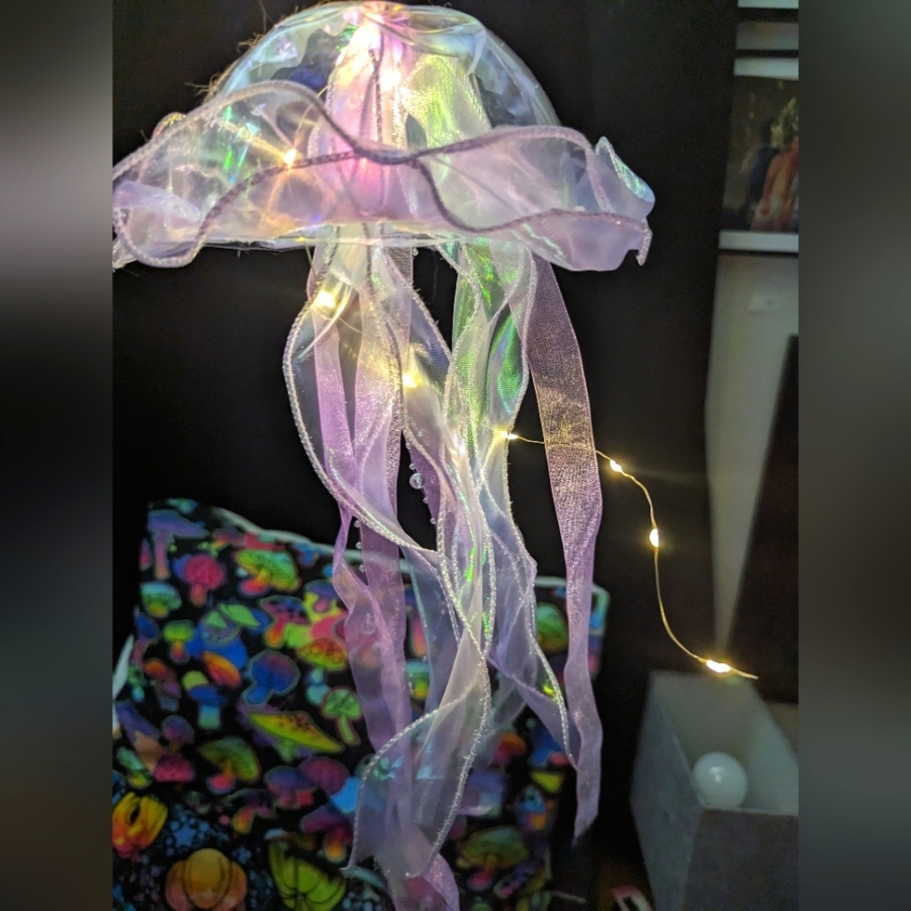 Purple 3 setting light up jellyfish.